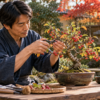 秋の日本庭園で赤い実が付いた実もの盆栽の枝を、日本人男性が剪定鋏で丁寧に手入れする様子